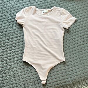 Babaton pink tee shirt bodysuit
